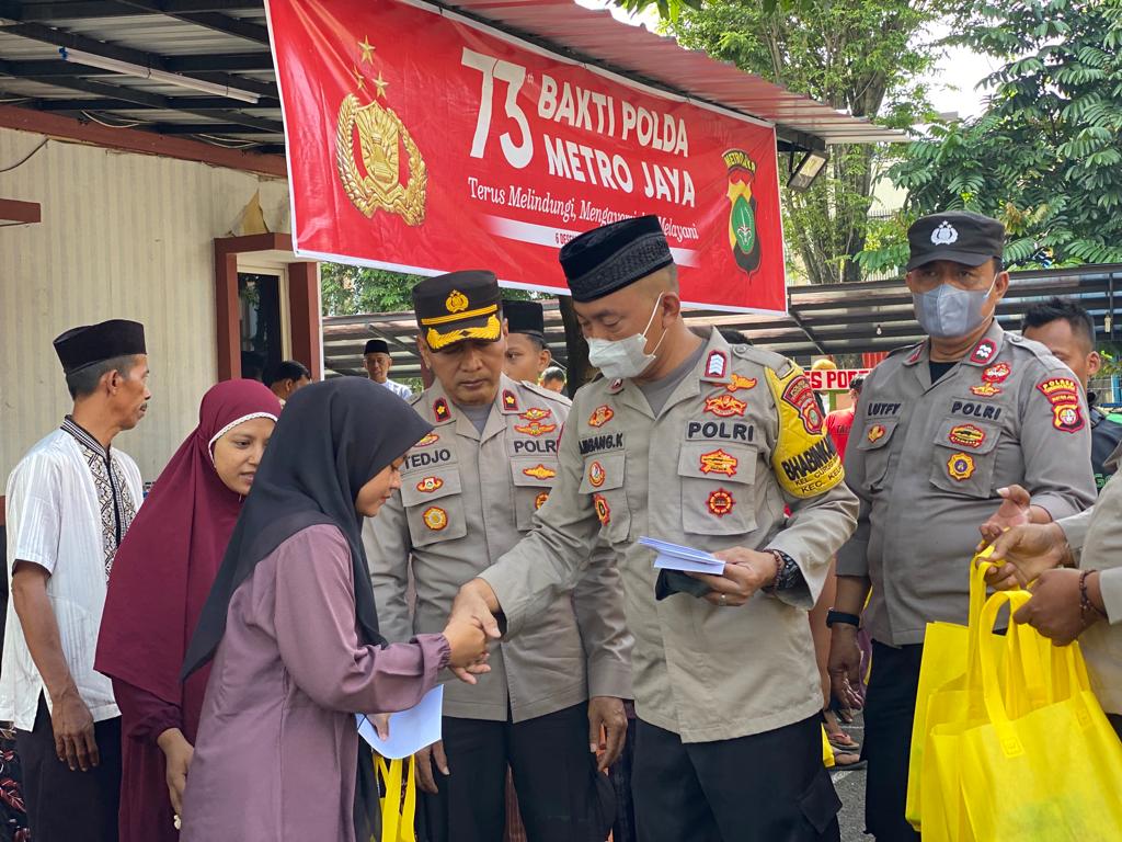 Peringati Hari Ulang Tahun (HUT) ke-73 Polda Metro Jaya, Jajaran Polsek Kelapa Dua menggelar bakti sosial dan santunan anak yatim. (tangselpos.id/rmn)