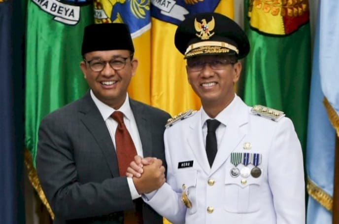 Mantan Gubernur DKI Jakarta Anies Baswedan dan Pj Gubernur DKI Jakarta Heru Budi Hartono. (Ist)