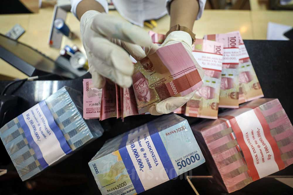 Turun Tipis, Rupiah Dibuka Rp 14.877 Foto : Ist