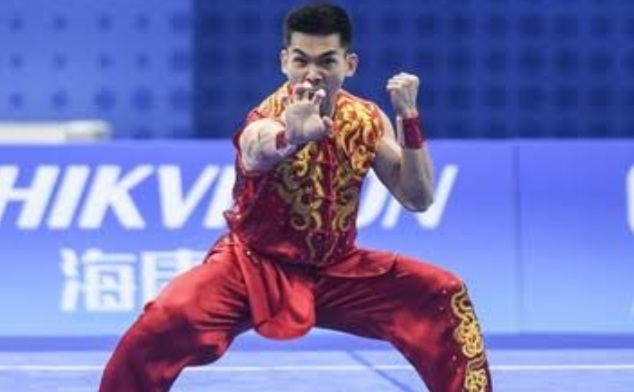 Harris Horatius atlet Wushu penyumbang medali emas untuk kontingen Indobesia.