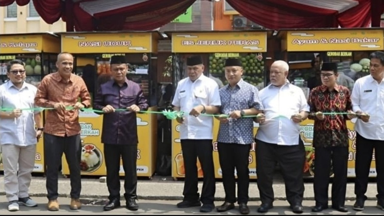 LAZ Al Aqsha Delatinos Bagikan Gerobak Ke Pelaku UMKM Lembaga Amil Zakat (LAZ) Al Aqsha Delatinos kembali menyelenggarakan program 1.000 Gerobak Berkah bagi para pealku UMKM di Kota Tangerang Selatan (Tangsel).(dra)
