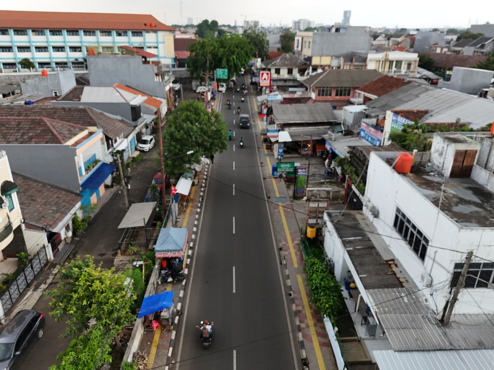 Pemkot Bikin 17 Ruas Jalan Jadi Mulus & Atasi Genangan Kondisi ruas jalan di Tangsel usai dilakukan sentuhan oleh DSDABMBK Kota Tangsel, Rabu (18/12). Sumber foto : DSDABMBK Kota Tangsel.(rmn)