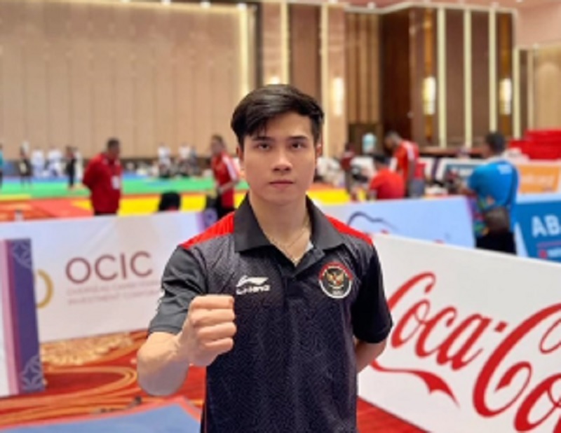 Atlet wushu Seraf Naro Siregar rebut medali pertama untuk Indonesia. Foto : Ist