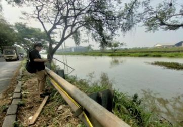 Lokasi penemuan mayat dalam boks kontainer di Kali Cadas, Tangerang. Foto : Istimewa