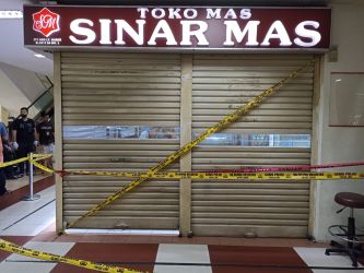 Polisi pastikan rampok yang beraksi di toko emas, Serpong, Tangerang Selatan (Tangsel), menenteng senjata, pada Jumat (16/9/2022).. (tangselpos.id/mg-1)
