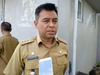 Camat Setu Erwin Gemala Putra.
