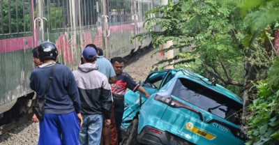 Sopir Taksi Green SM ditetapkan jadi tersangka kasus tabrakan kereta di Stasiun Bekasi Timur. Foto : Ist